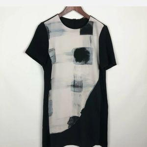 Zara Dress with Modern Design On the Front.